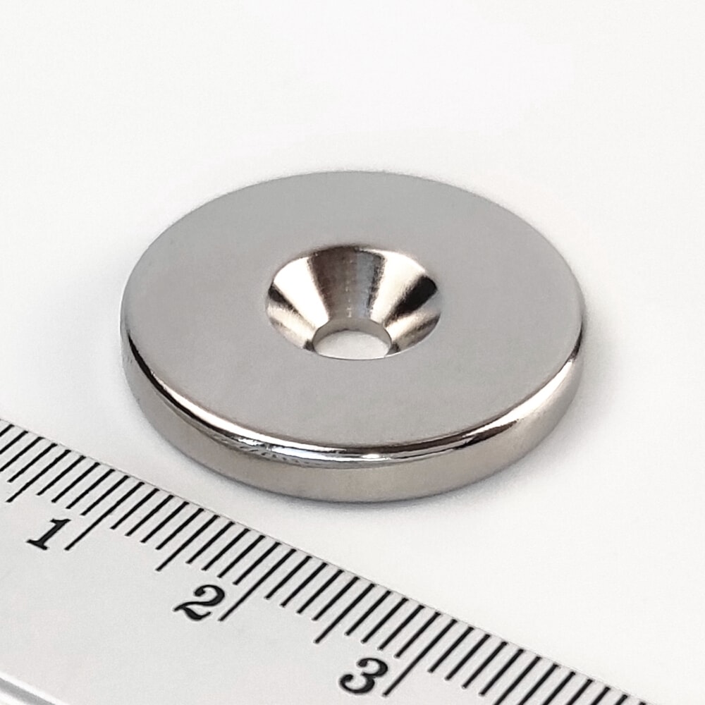 Magnet neodýmový valec 27×4 mm s dierou M4/8,1kg (južný pól na strane s priehlbinou) – N38 V27-4-M4-N38-S - magnety | MasMasaryk